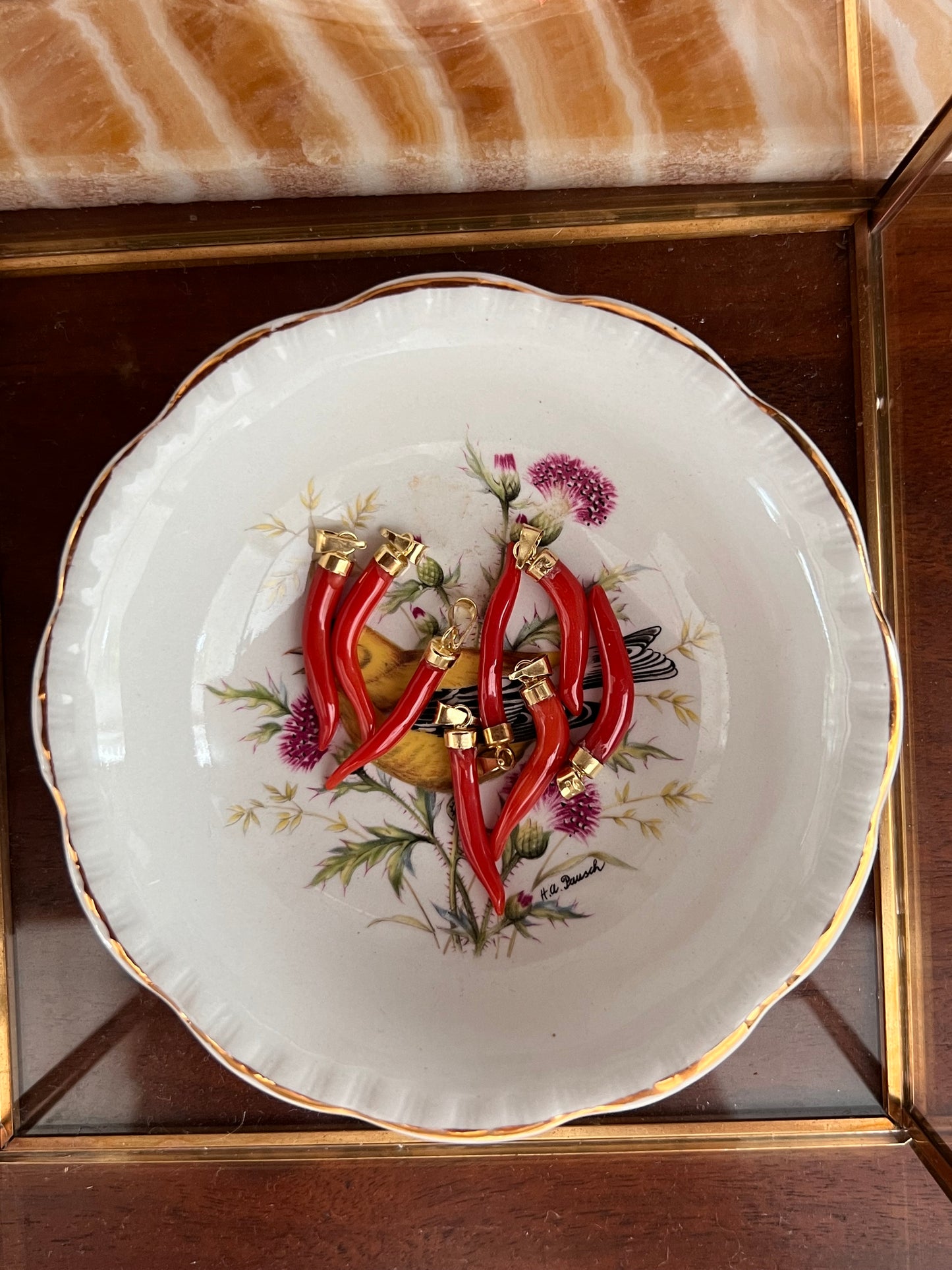 Theia’s Signature Protection Horn yellow 18k gold & Natural Red Mediterranean Coral