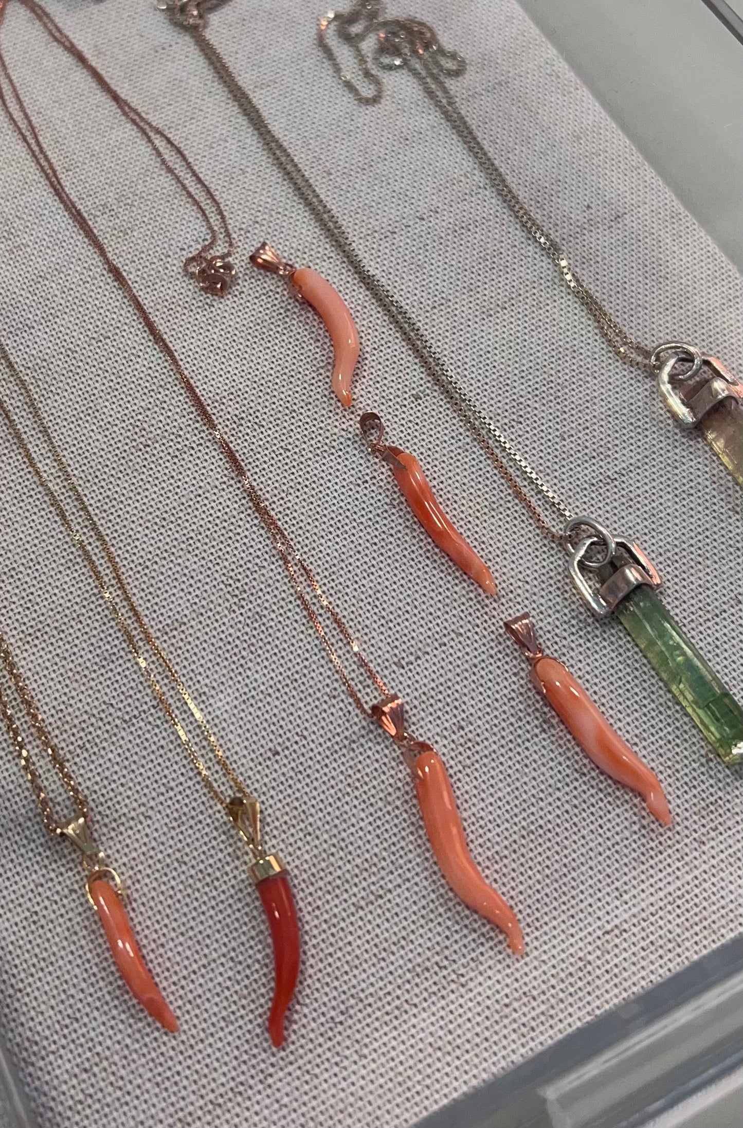 Theia’s Signature Protection Horn yellow 18k gold & Natural Red Mediterranean Coral